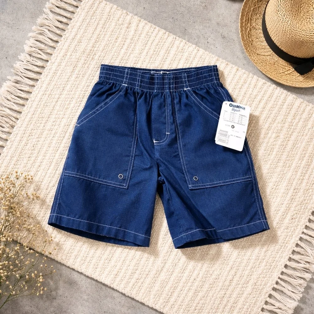 OshKosh B'gosh blue swim trunks size 5 with white stitching